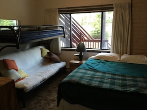 BUNK WITH TWIN FUTON AND QUEEN SIZE BED IN MASTER BEDROOM