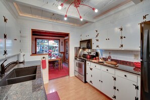 Newly updated kitchen leads into the dining room