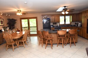 Main floor/upstairs kitchen area looking toward the lake