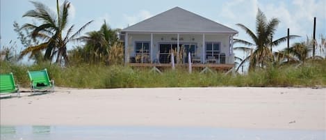 A view of Kiss a Fish Beach cottage taken right from the water.