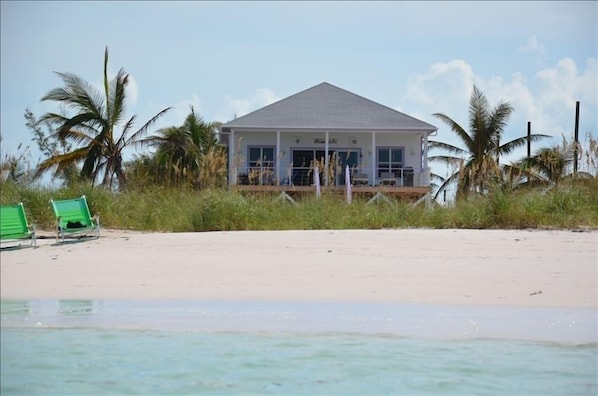 A view of Kiss a Fish Beach cottage taken right from the water.