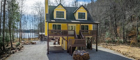 Main front view, see waterfront cove beyond the home. Dales Creek to the right.