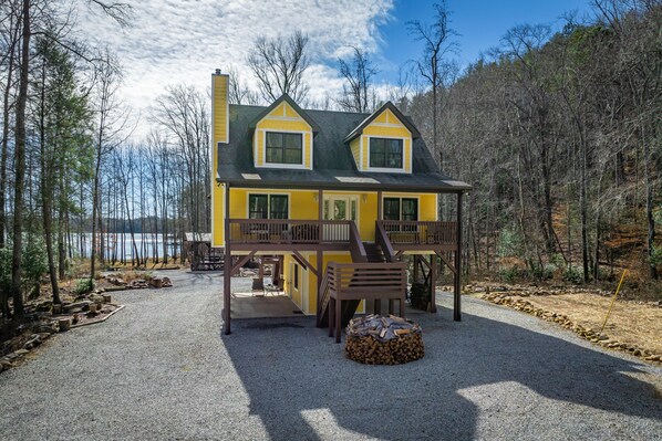Main front view, see waterfront cove beyond the home. Dales Creek to the right.