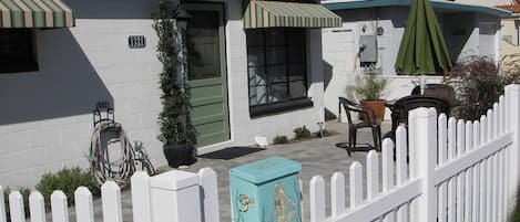 Front of the main house with large patio and sitting area