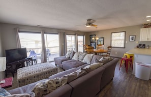 Walk into the house and relax on the oversized couch.