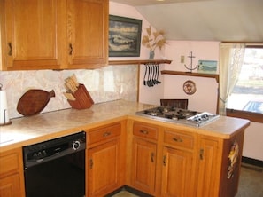 Seating behind the counter for quick meals or to keep the chef company.