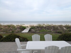 Outdoor mealtime view! Only steps from the sand & yard for outdoor lawn games!