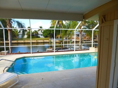 Prime location! Family/pet friendly, private pool, lanai, dock, boat lift &more.
