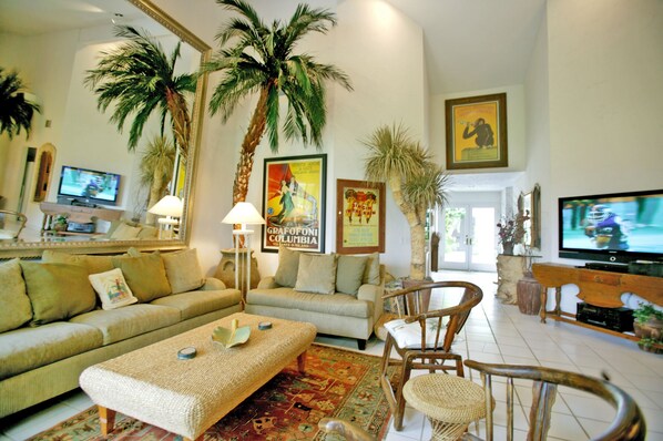 Living room has wide screen plasma HDTV