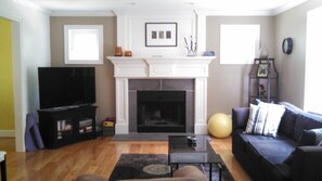 living area open to the kitchen ...has swivel chair not shown and 2 extra chairs
