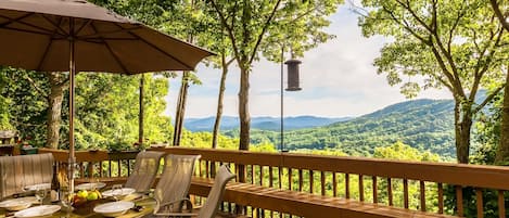 Picnic on the 50-foot deck with patio table seating for 6 and the majestic view