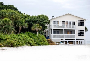 Side view of house with pleanty of beach to take a long stroll