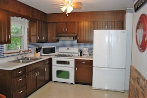 The kitchen and dining area is a bright, spacious room to share family meals