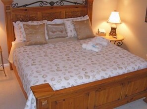 Master King Bed with soft high thread count linens