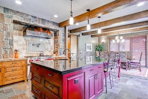 Chef's kitchen with all the necessary pots, pans and utensils