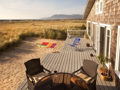Our large beachside deck, with great sand play area for the kids & Patio Set