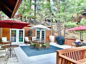Large patio with multiple tables and seating options