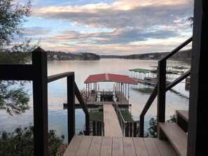 View of the dock, swim pier and water from the bottom covered deck