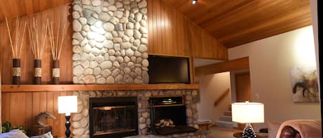 Living room with real wood burning fireplace