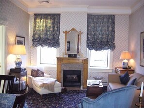 Living room with gas fireplace and flat screen television