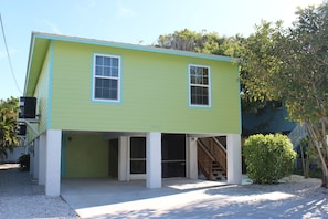 Front of Duplex. Each unit has it's own shady parking and screen porch.
