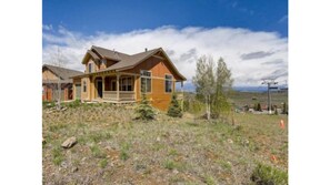 Ski house sits on slope and Kicking Horse Lift