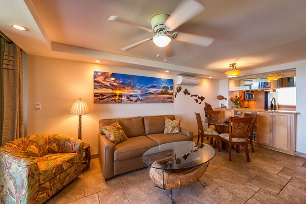 Living Room - Sit back and enjoy this open airy living room with custom artwork throughout