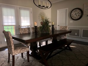 Dining room table sits 8 adults comfortably or more with kids.