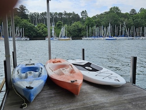 Kayaks and paddle board for your use.
