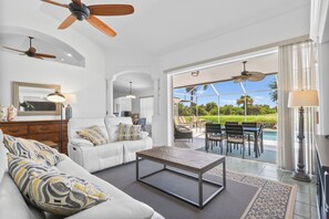 View from main living room to deck with pocket sliders