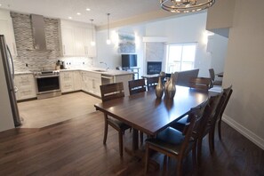 The open-concept living space offers plenty of seating, making it ideal for groups to gather and relax.