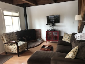 Living room with gas fireplace Roku, Cable and yes, still a DVD!