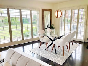 Open dining area with surround outdoor view and easy access to the outdoor patio