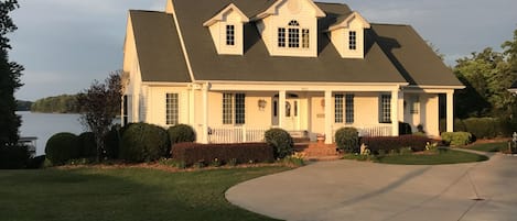 The home has beautiful views of Lake Keowee. The back yard is gently slopped.