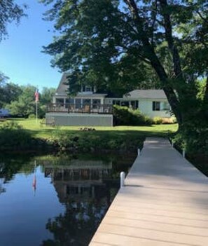 View of lakeside of house from dock.