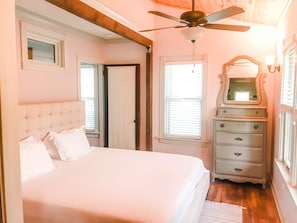 Master Bed w/ Vaulted Pine ceilings, Oak beams and Floors.