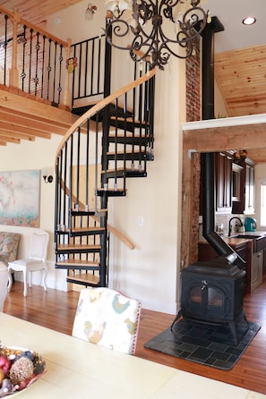 Spiral stairs to the Loft bedroom, wood burning stove for that extra charm.