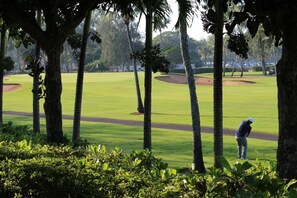 Patio view, 18th Green, Resort, Golf Clubhouse & Lei Lei's Restaurant is nearby.