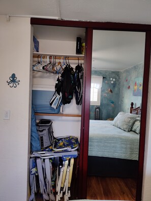 2nd Bedroom closet is full of beach toys, beach chairs coolers etc