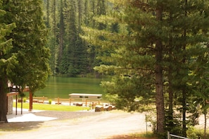  Outlet Bay Cove, HOA Sandy Beach with Fire Pit, Picnic Table and swimming area.