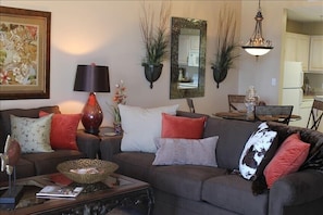 Living room has plenty seating with space for kids. Sofa can be bed at night.