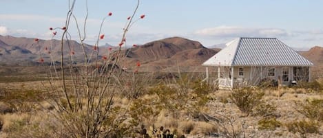 View of Property with Hills in Background