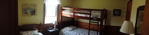 #10 Front Bedroom. Has one twin bed and twin bunk beds.