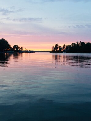 Sunset view from dock,  between mainland and island 