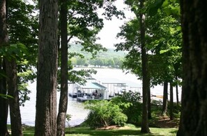 Incredible lake views! Mature trees on 1 acre.