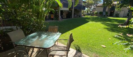 Enjoy your morning coffee on the lanai, overlooking the beautiful gardens.