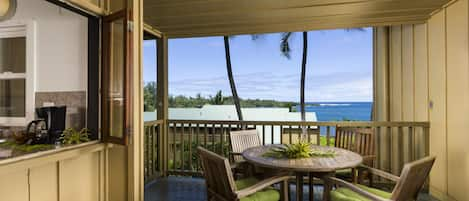 Lanai with view of Hana Bay and pass-thru window to kitchen