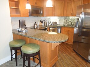 Fully appointed kitchen with dishwasher and high-end appliances 