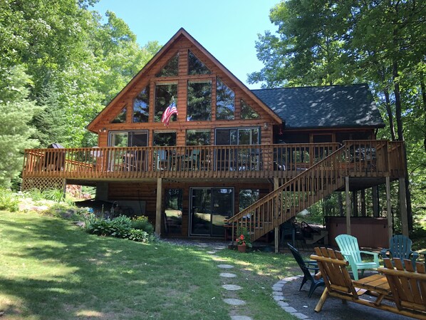 Large wrap around deck catches the afternoon sun. Screen porch for shade. 