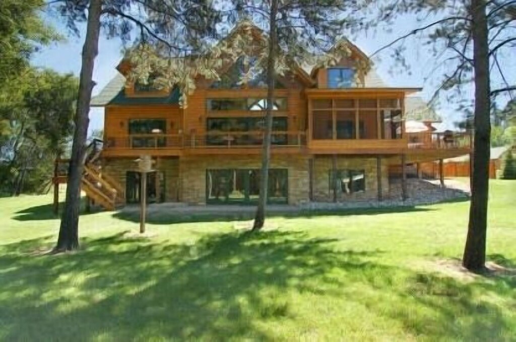 North Long Lake luxury home w/carriage house on 7+ wooded ...